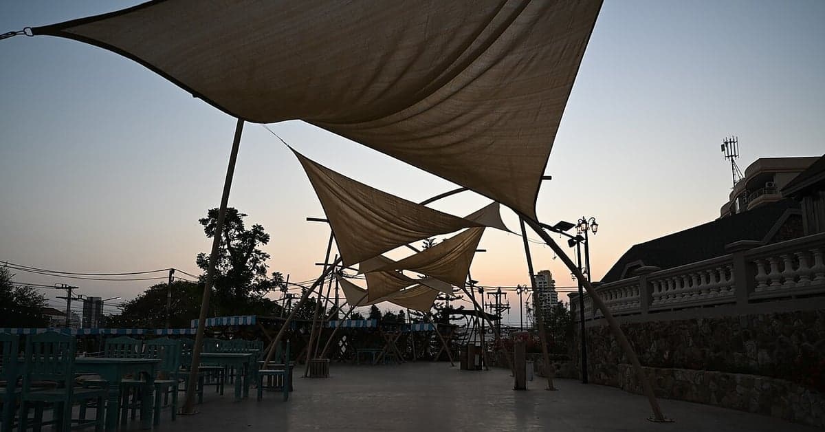 Shade sails over a seaside terrace