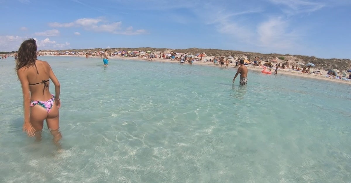 The pristine white sands and turquoise shallow waters of Ses Illetes Beach on Formentera island