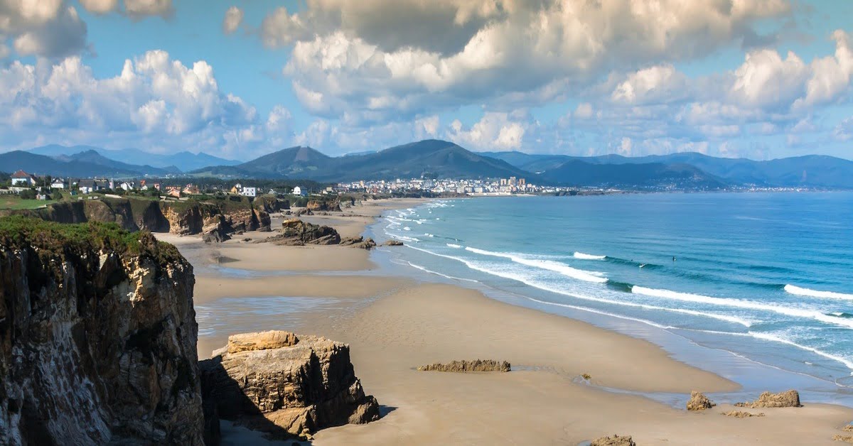 The dramatic natural rock arches and formations of As Catedrais Beach in Galicia at low tide