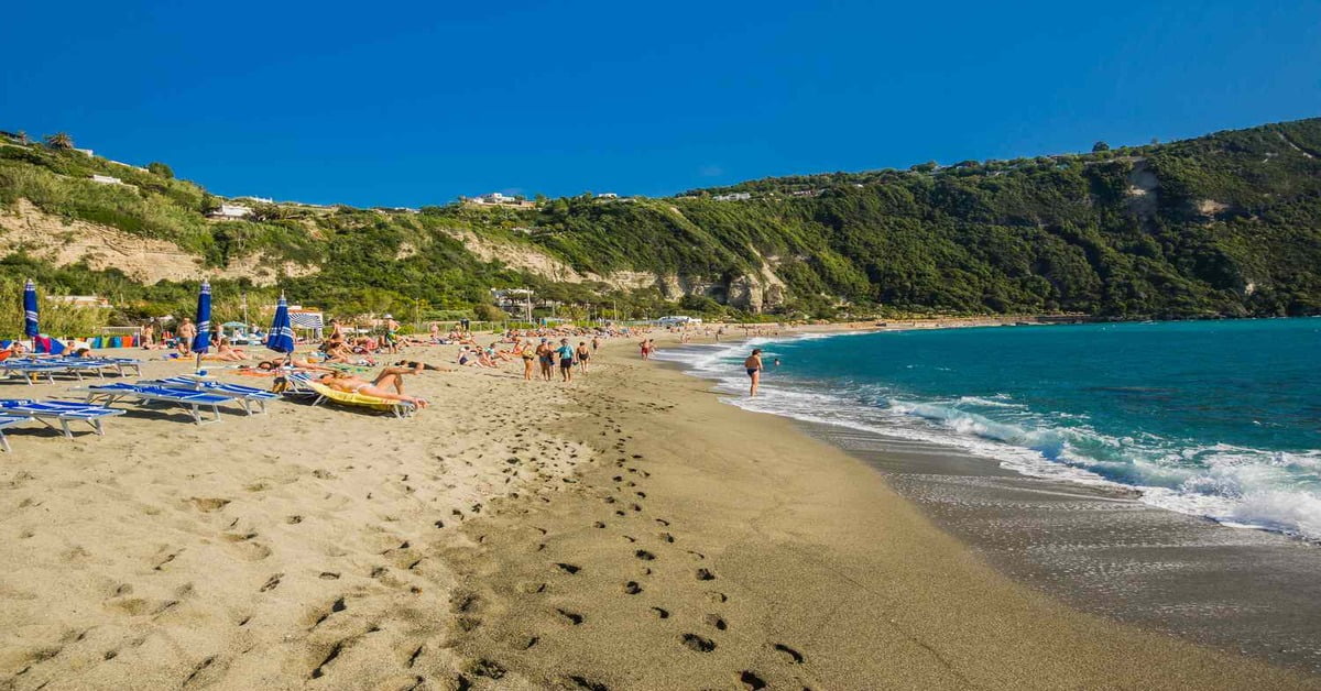 The lush green landscape and beaches of Ischia island in the Bay of Naples