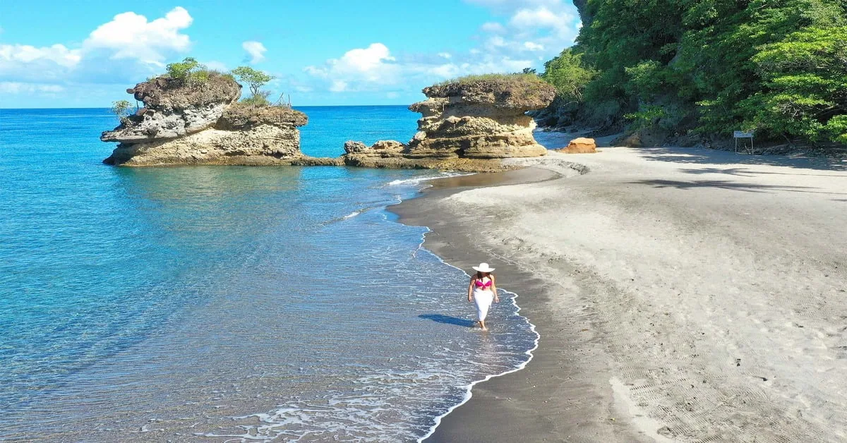 Anse Chastanet Beach in St. Lucia with the dramatic Piton mountains rising in the background