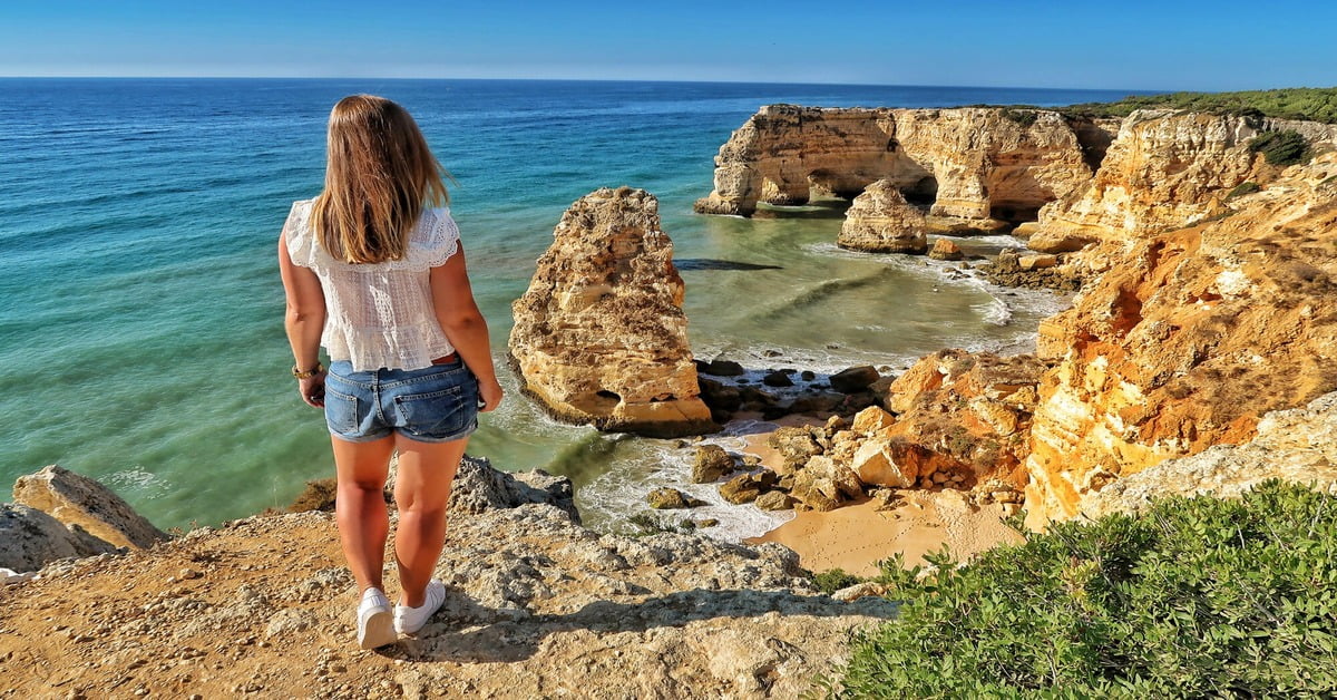 Praia da Marinha in Portugal with limestone cliffs and arches