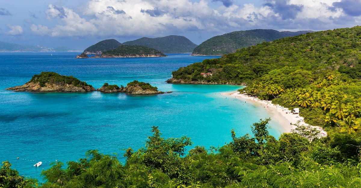 Trunk Bay in St. John with clear water and green hillsides