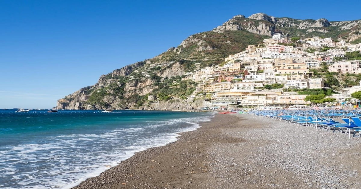 Marina Grande beach in Amalfi town with the historic Cathedral of Amalfi rising above the shoreline