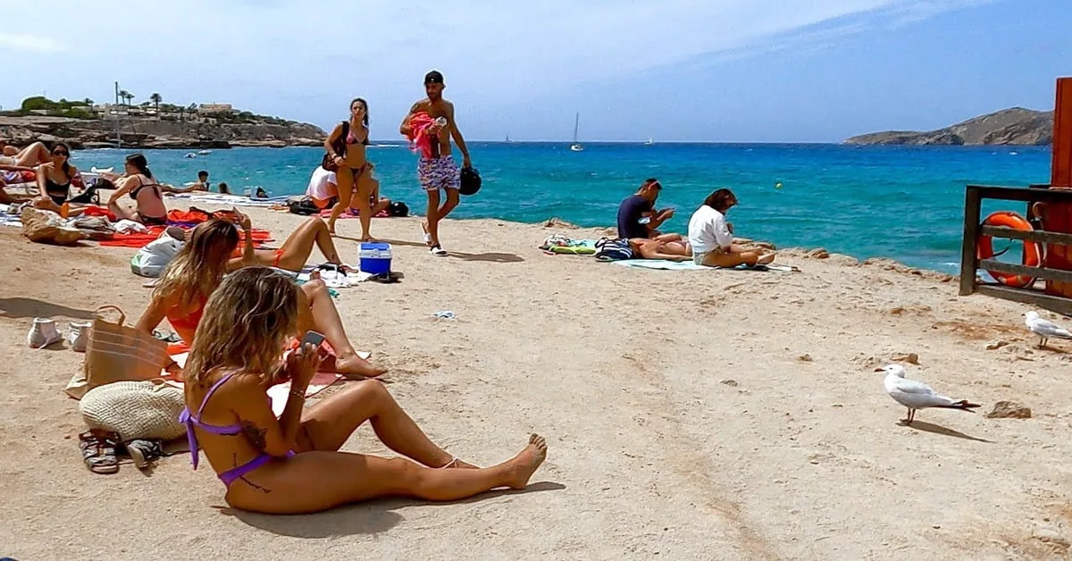 Beautiful beach cove in Ibiza, Spain with crystal clear Mediterranean water