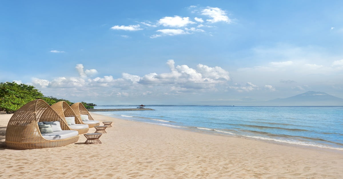 Calm turquoise waters and white sand at Nusa Dua Beach in Bali