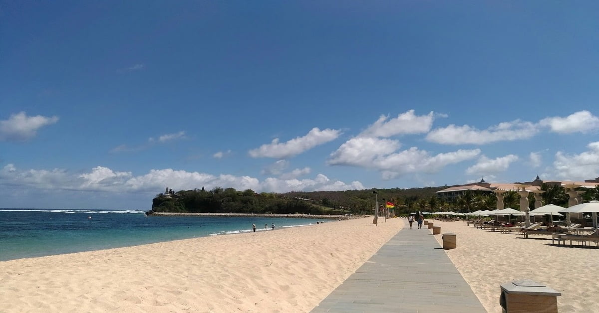 Crystal clear calm waters at Nusa Dua Beach in Bali with white sand