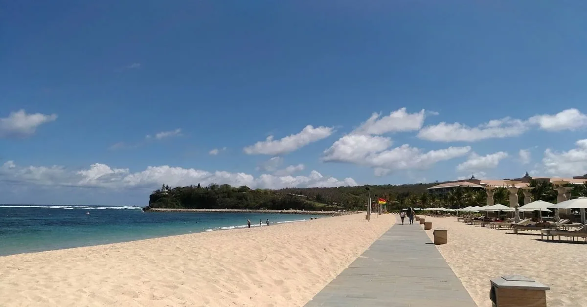 Crystal clear calm waters at Nusa Dua Beach in Bali with white sand