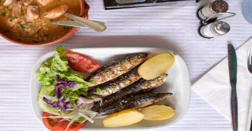 Traditional Portuguese seafood dishes including grilled fish and shellfish