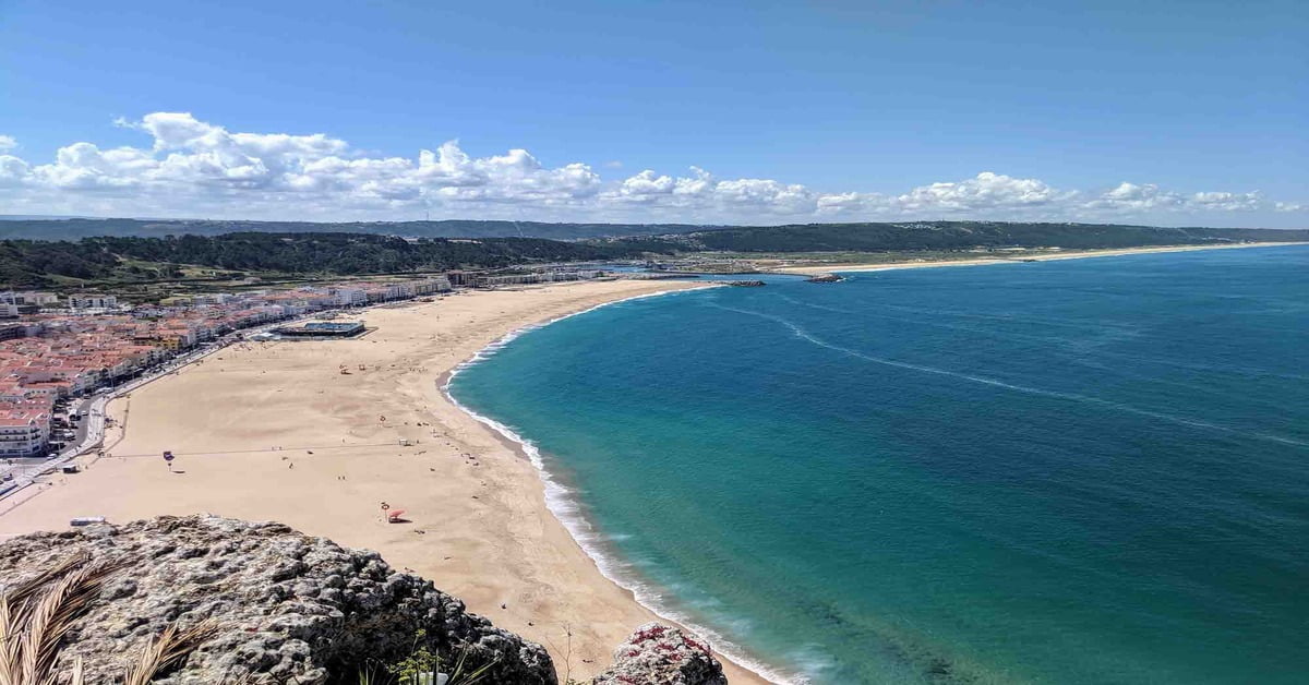 The famous big wave beach of Nazare, Portugal with massive Atlantic swells