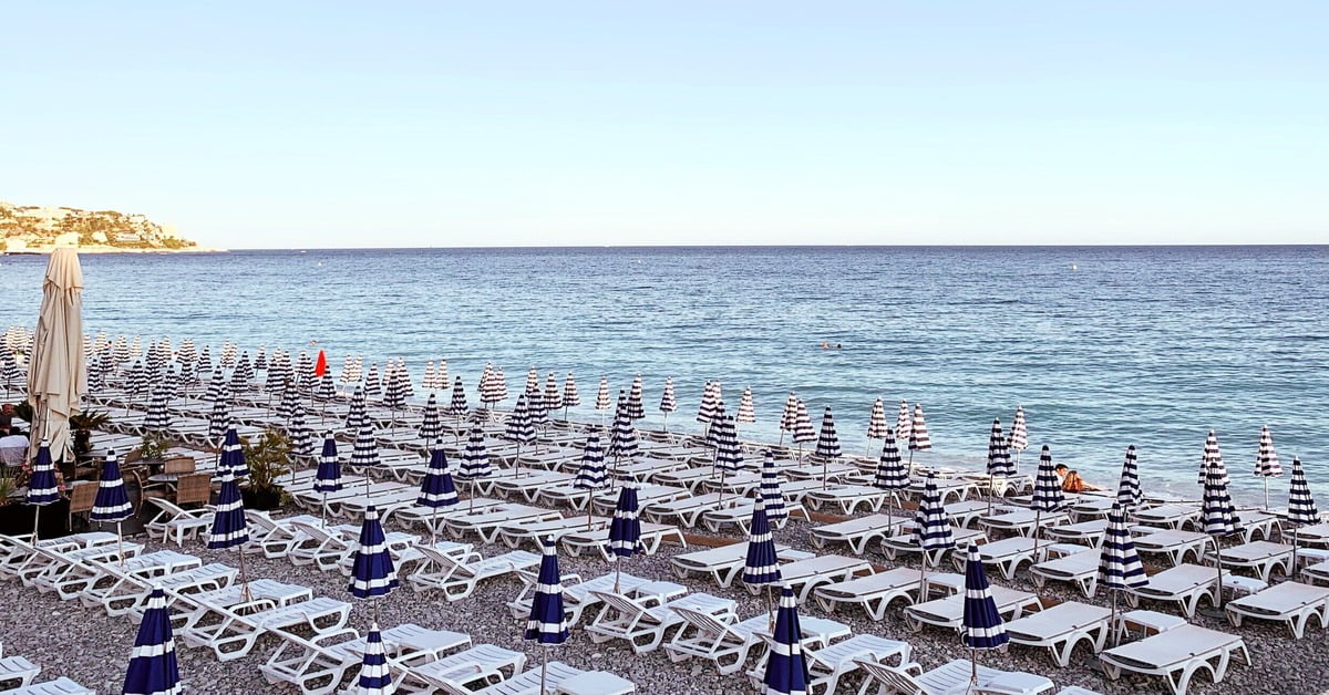 Glamorous beach along the Cote d'Azur French Riviera with azure Mediterranean water