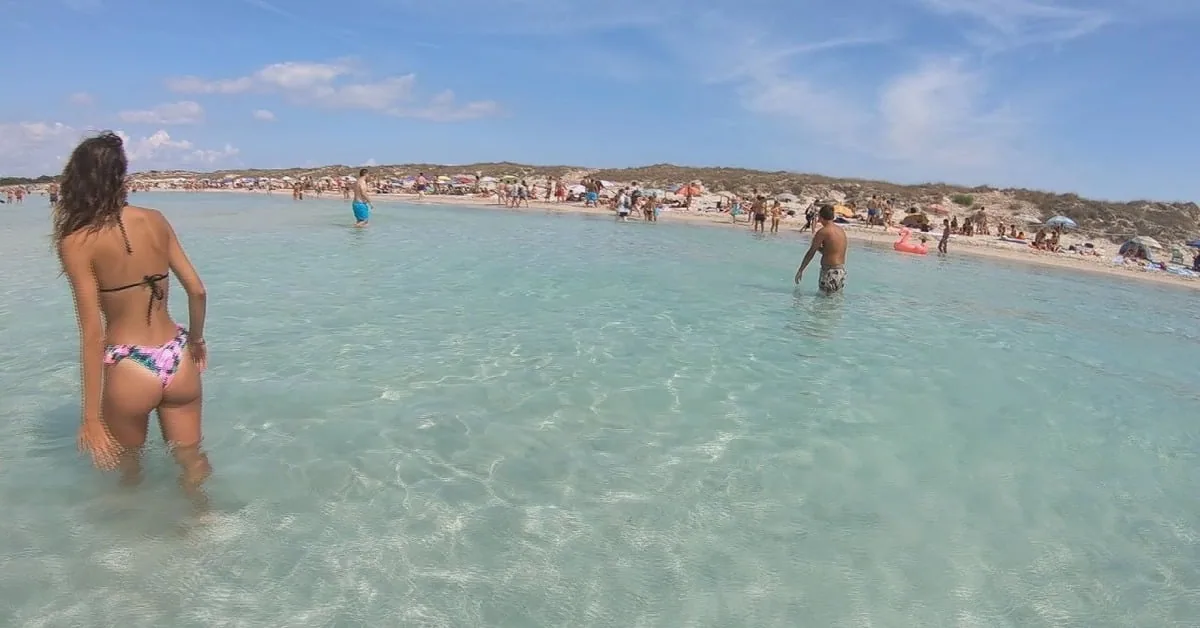 Crystal clear turquoise water at Playa de Ses Illetes in Formentera, Spain