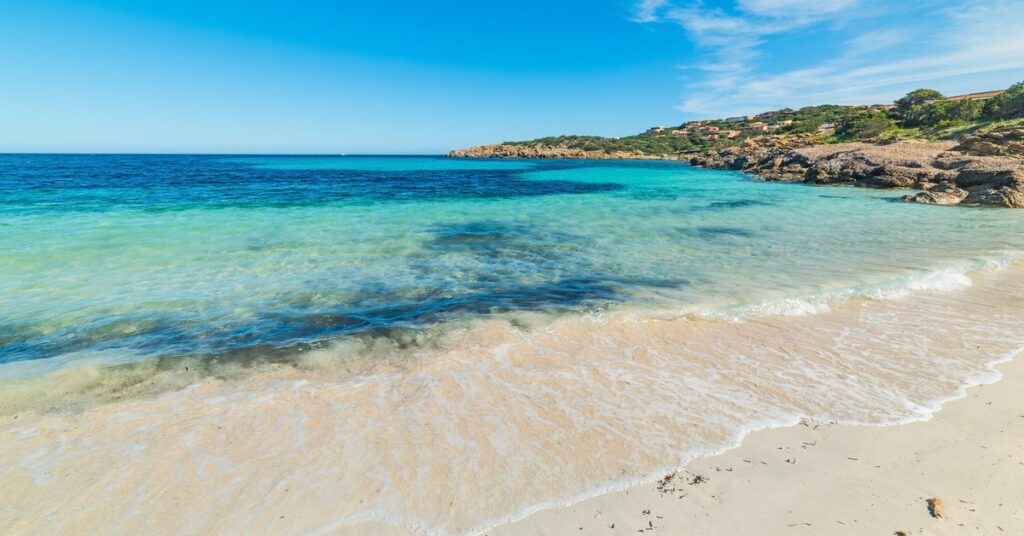 Luxurious Costa Smeralda beach in northeastern Sardinia with emerald water