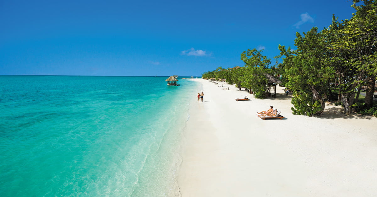 Sandals South Coast overwater bungalows and pristine beach in Whitehouse, Jamaica
