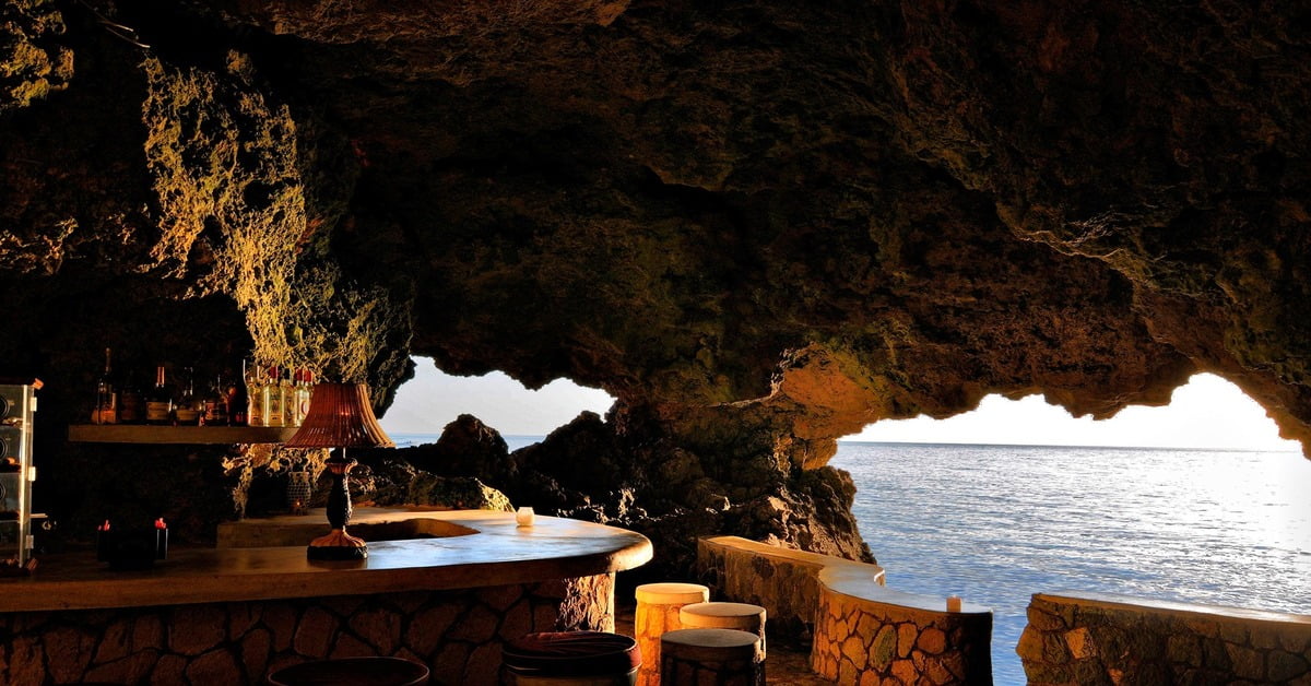 The Caves boutique resort nestled into dramatic limestone cliffs in Negril
