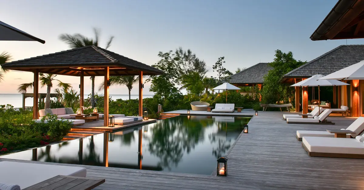 COMO Parrot Cay private island resort with white sand beach and turquoise waters