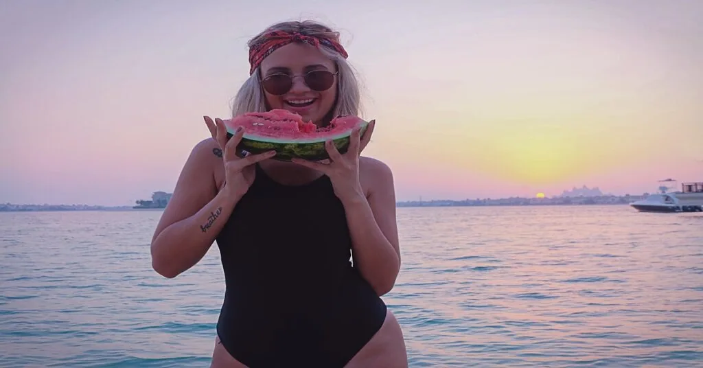 Woman enjoying a day at the beach in stylish swimwear